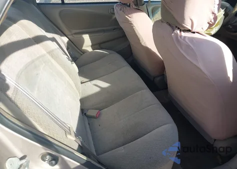 2001 Toyota Corolla Le z USA, uszkodzony, nr VIN 2T1BR12E61C501771